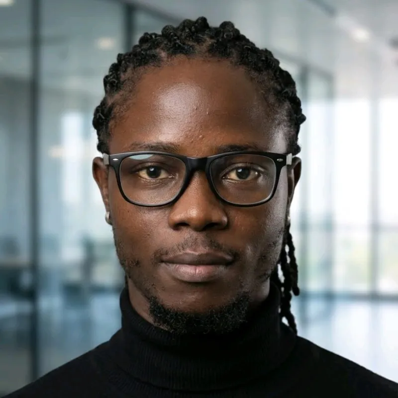 Oladapo Omonayajo in a black turtleneck, head-and-shoulders portrait